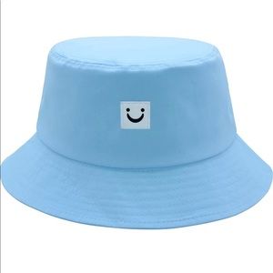 Light blue smile bucket hat outdoor